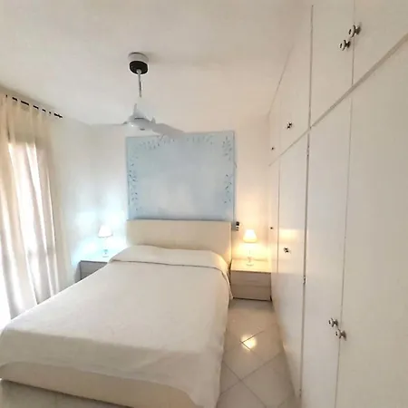 Aparthotel In Marinella Just 100 Mt From The Sea, With Air Conditioning And Private Outdoor Area